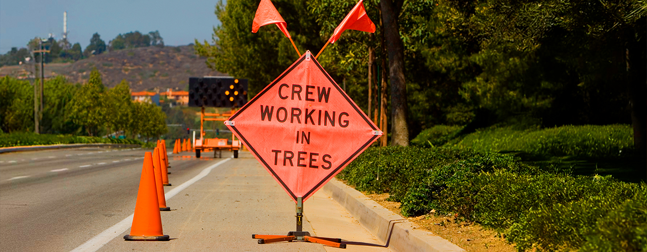 roll-up sign being used in roadside work