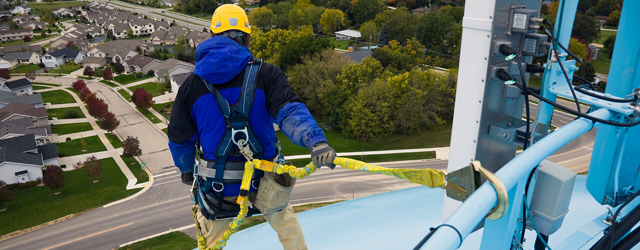 Worker using a safety harness