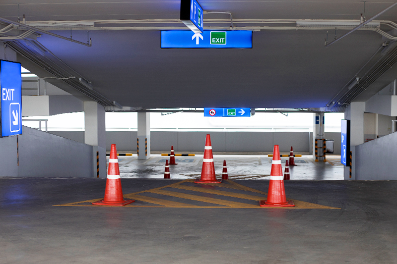 Parking lot with cones and signs